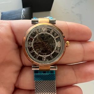 Kenneth Cole women’s automatic watch